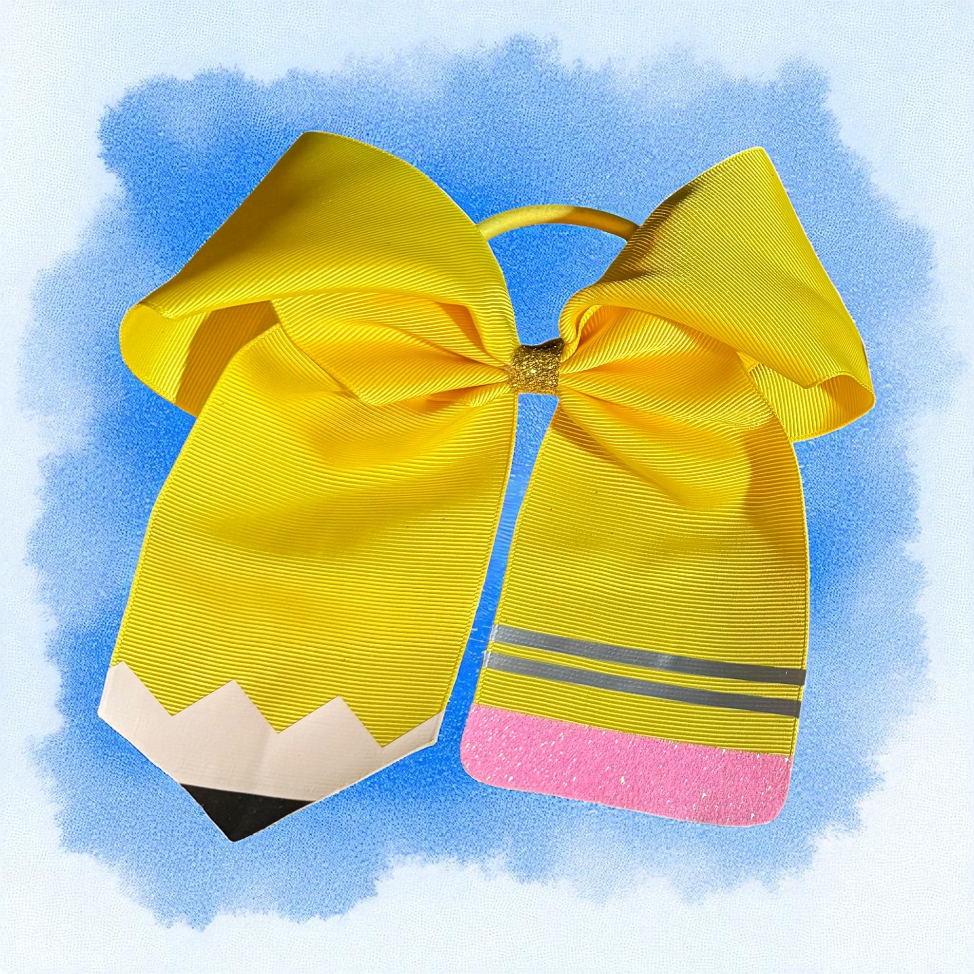 Yellow bow shaped like a pencil with a pink base 