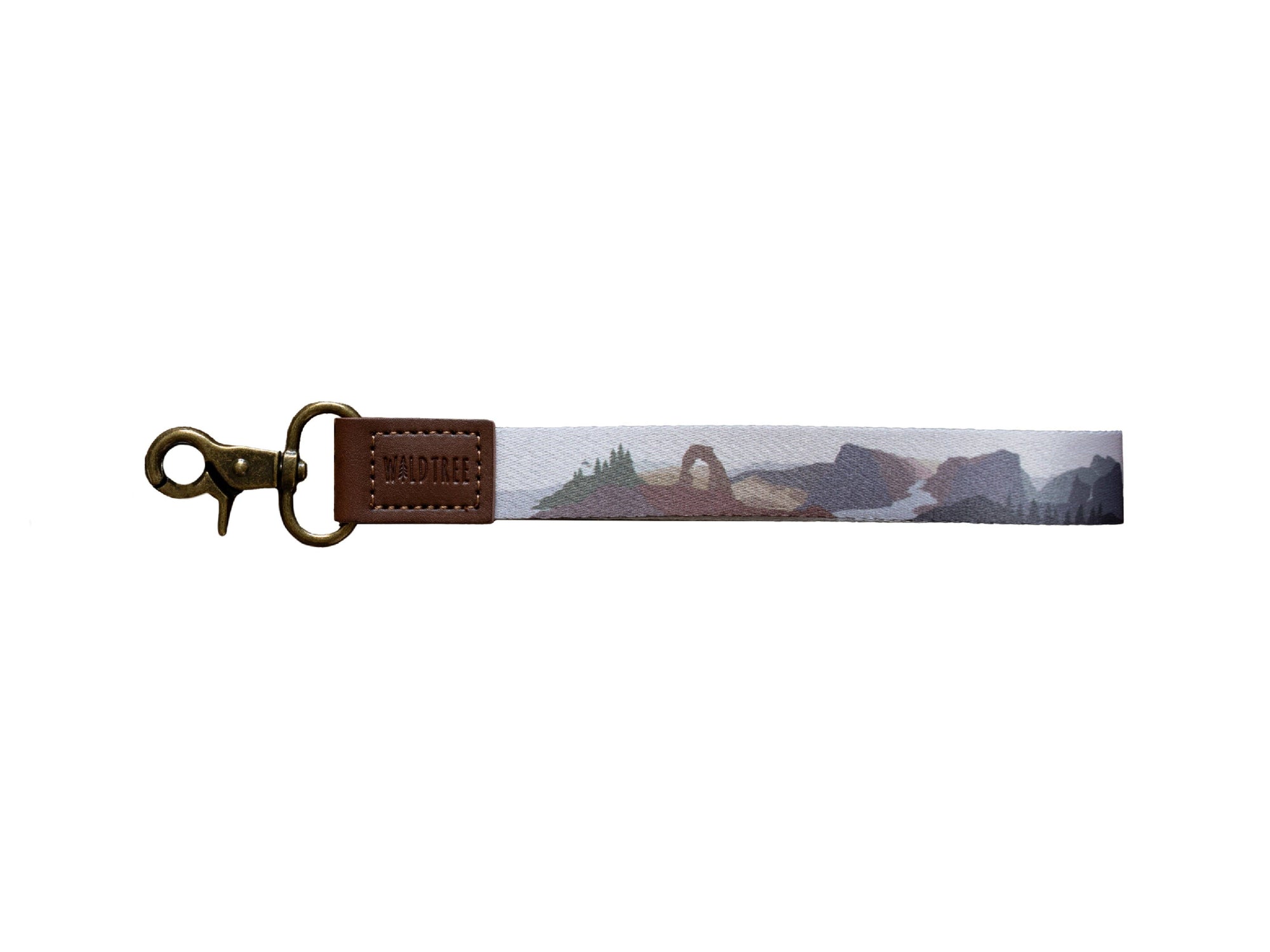 Keychain strap with scenic design and brown leather tag in color